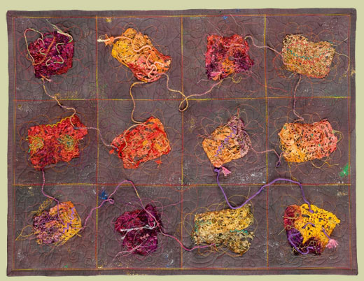 Image of quilt titled “Space Debris: A Sampler” by Jo VanPatten 